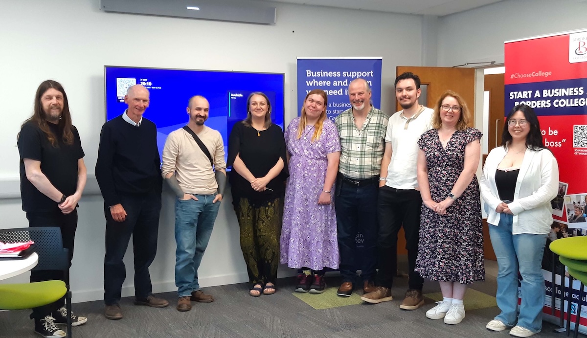Group of candidates standing in a classroom setting