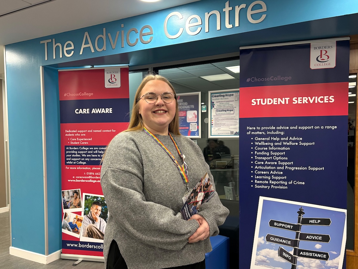 Photo of a Borders College employee standing outside the Student Advice Office