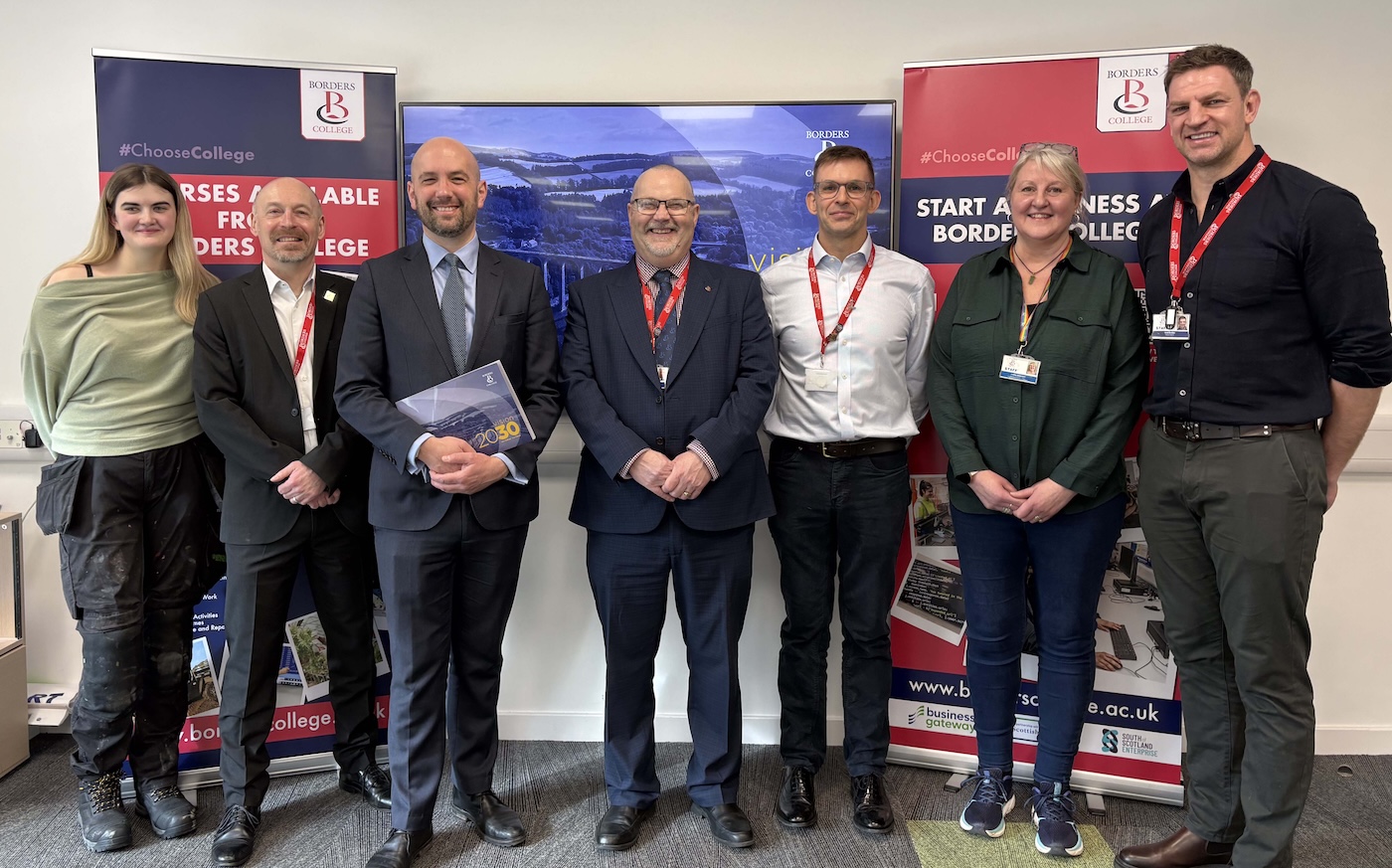 Group photo of Borders College staff standing with Minister Ben Macpherson 